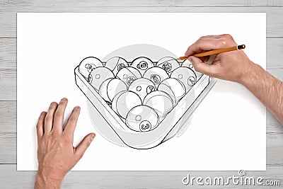 Male hands holding pencil and drawing pool and billiard triangle on white paper Stock Photo