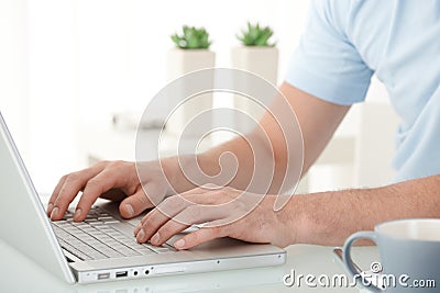 Male hands typing on keyboard Stock Photo