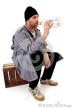 Male homeless tramp with empty bottle Stock Photo