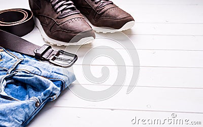 Male jeans, belt and shoes with text space Stock Photo