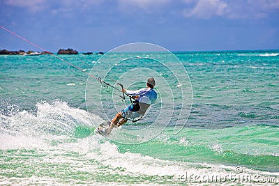 Male Kitesurfer cruising Stock Photo