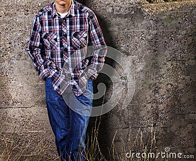 Male leaning on Wall Stock Photo