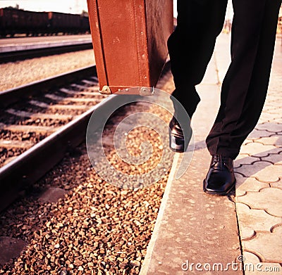 Male legs and suitcase Stock Photo