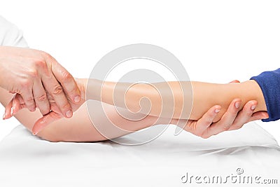 Male masseur doing massage of female hands close up Stock Photo