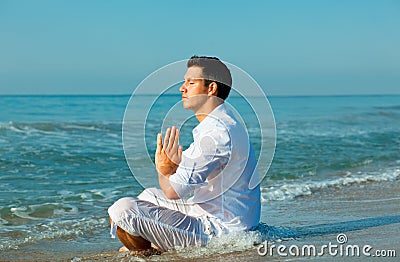 Male mediation beach Stock Photo