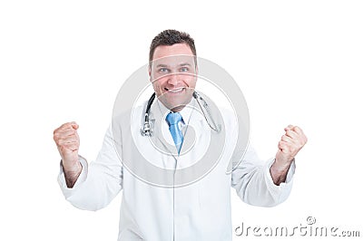 Male medic or doctor feeling winner, enthusiastic and happy Stock Photo