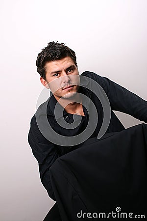 Male Model on chair Stock Photo