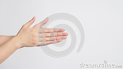 Male model is rubbing hand plams together on white background Stock Photo