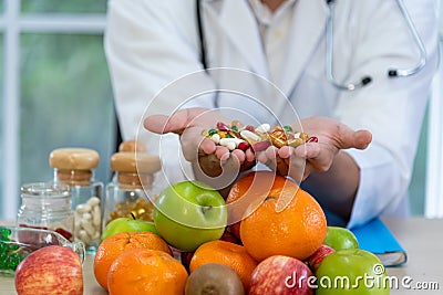 Male nutritionists are presenting fresh food and fruit Stock Photo