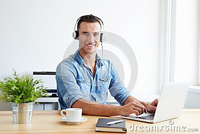 Male operator with headset in the office Stock Photo