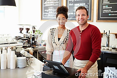 Male Owner Of Coffee Shop Stock Photo