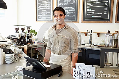 Male Owner Of Coffee Shop Stock Photo