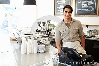 Male Owner Of Coffee Shop Stock Photo