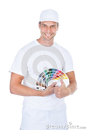 Male Painter With Swatch Book Stock Photo