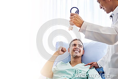 Male patient get encourage by expert doctor to build confidence that treatment is the standard of the medical industry Stock Photo