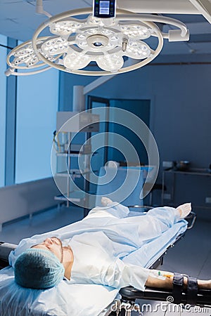 Male Patient prepared by a team of anesthetists for abdominal surgery, hospital Stock Photo
