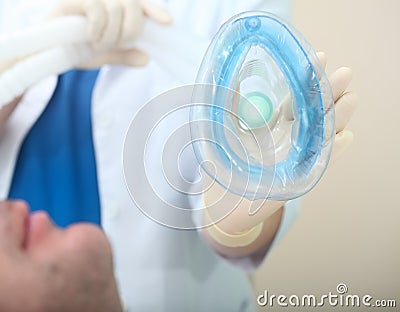 Male patient before respiratory anaesthesia with breathing mask Stock Photo