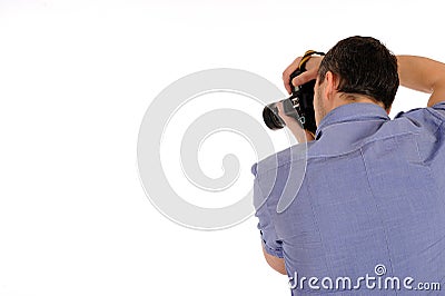 Male photographer from back taking picture Stock Photo
