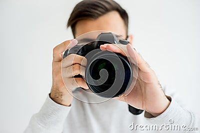 Male photographer with camera Stock Photo