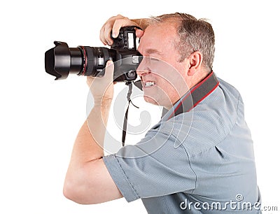 Male Photographer Shooting Something Stock Photo