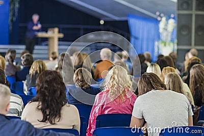 Male Professional Lecturer Speaking In front of the People. Editorial Stock Photo