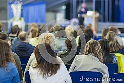 Male Professional Lecturer Speaking In front of the People. Editorial Stock Photo