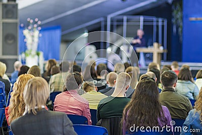 Male Professional Lecturer Speaking In front of the People. Editorial Stock Photo