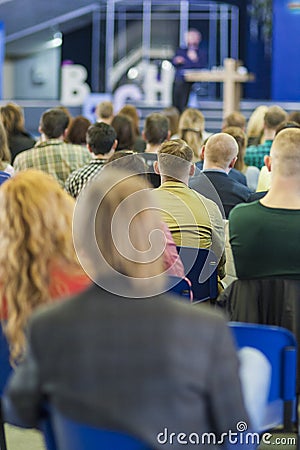Male Professional Lecturer Speaking In front of the People Editorial Stock Photo