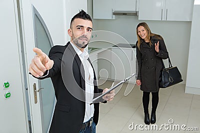 Male property broker showing houses to client Stock Photo