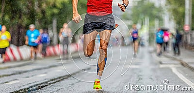 male runner leader running marathon city race Stock Photo