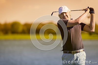 Male senior golfer from front. Stock Photo