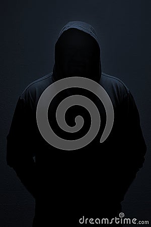 Male silhouette in casual sportswear with hood Stock Photo