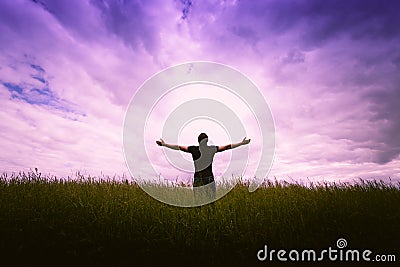 Male silhouette on sunrise background Stock Photo