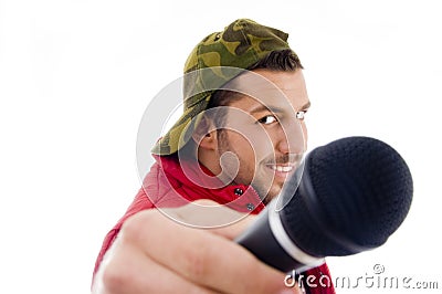 Male singer showing microphone Stock Photo