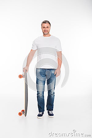 Male skateboarder on longboard Stock Photo