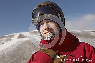 Male Snowboarder Smiling Stock Photo