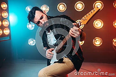 Male solo musican with electro guitar Stock Photo