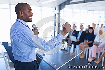 Male speaker speaks in business seminar Stock Photo