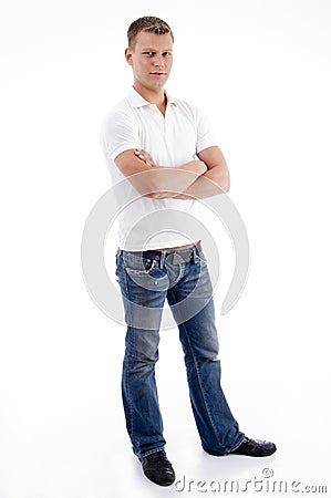 Male standing with folded arms Stock Photo