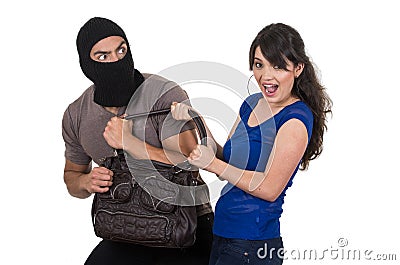 Male thief robbing beautiful young girl Stock Photo