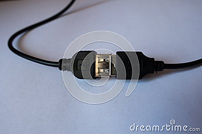 Male USB plug inserted into female receptacle Stock Photo