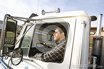 Male Worker Driving Truck Stock Photo