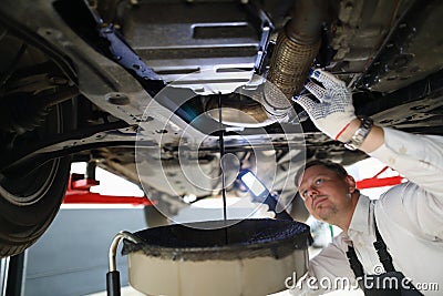 Male worker holding in hands electric torch Stock Photo