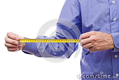 Male worker's hand holding Self-retracting tape measure meter Stock Photo