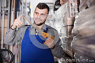 Male worker showing his working tools Stock Photo