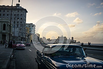 Malecon typical view in sunset with La Havana buildings at background, Cuba Editorial Stock Photo