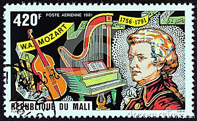MALI - CIRCA 1981: A stamp printed in Mali from the `225th Birth anniversary of Mozart` issue shows Mozart and Musical Instruments Editorial Stock Photo