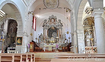 Mali Losinj, Croatia April 2020 - Central altar in Church of the Nativity of the Blessed Virgin Mary Editorial Stock Photo