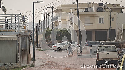Malia town near Heraklion on Crete Island in Greece during heavy rain and floodings. Editorial Stock Photo