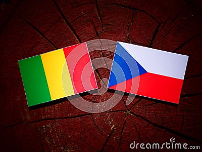 Malian flag with Czech flag on a tree stump Stock Photo